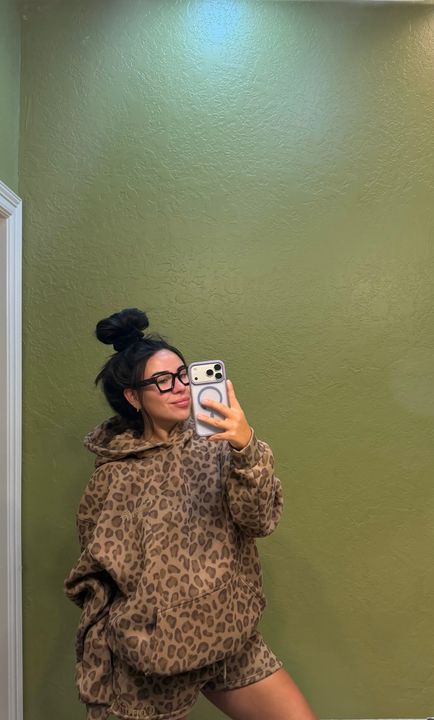 Customer Brooke wearing a Brown Leopard Comfrt hoodie